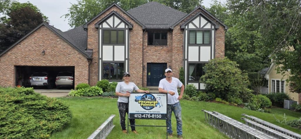 Exterior painters working on a home in Squirrel Hill Pittsburgh
