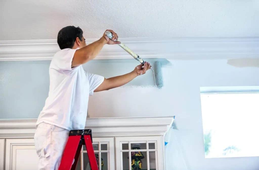 Professional painting contractor working on a home in Squirrel Hill Pittsburgh