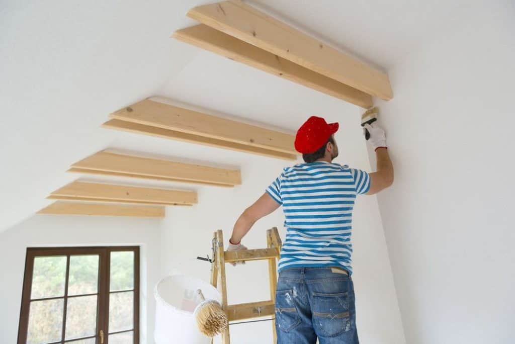 Professional ceiling painters working inside a Squirrel Hill home in Pittsburgh