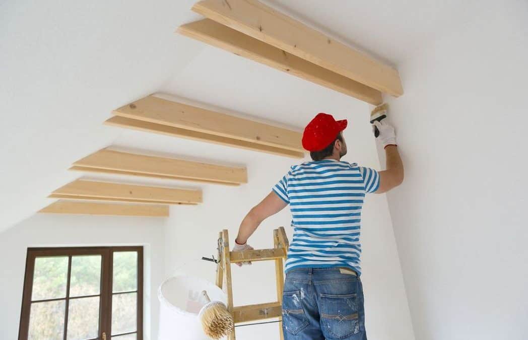 Professional ceiling painters working inside a Squirrel Hill home in Pittsburgh
